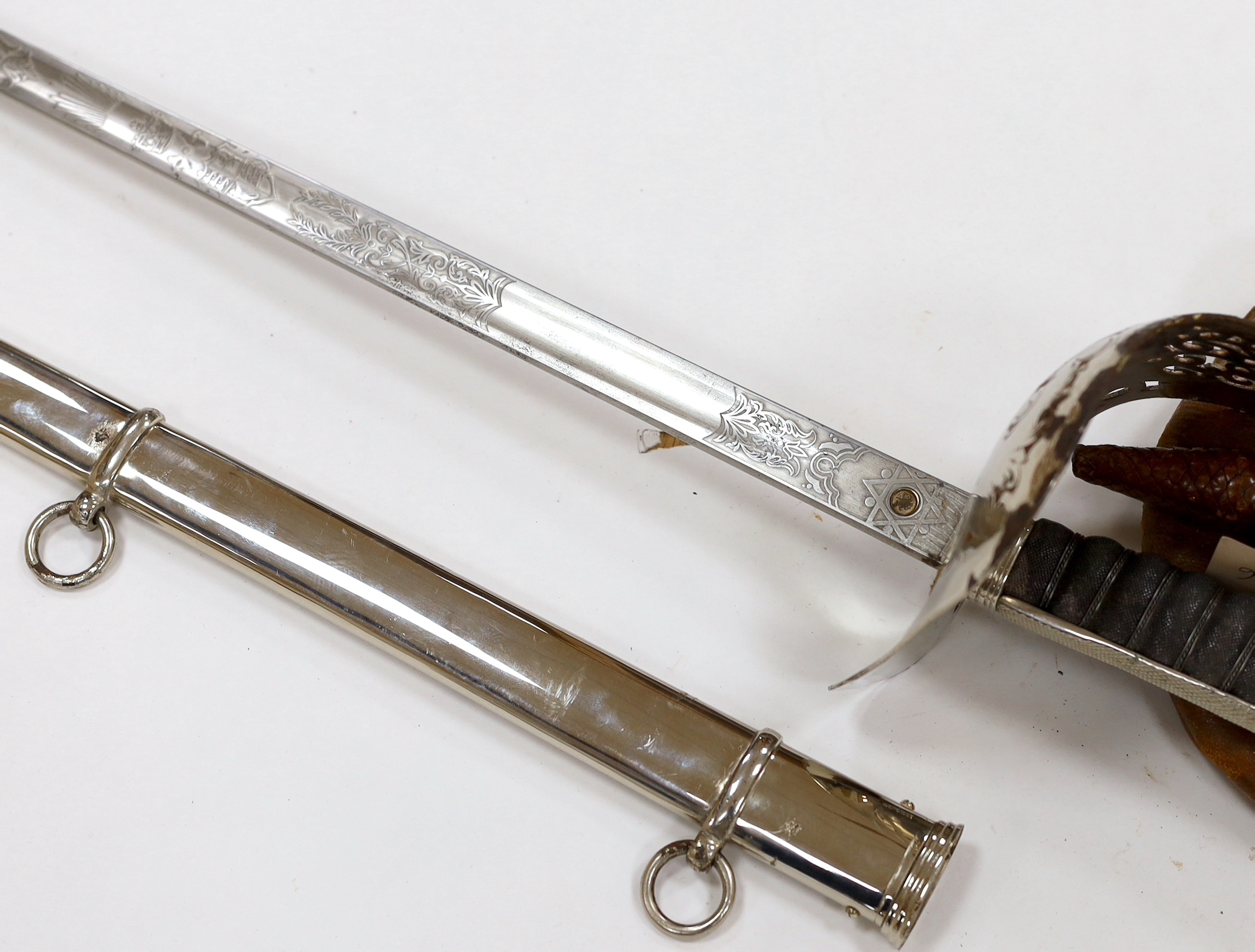 A George V officer's sword, maker Hawksworth Sheffield, in chromed scabbard, blade 82cm